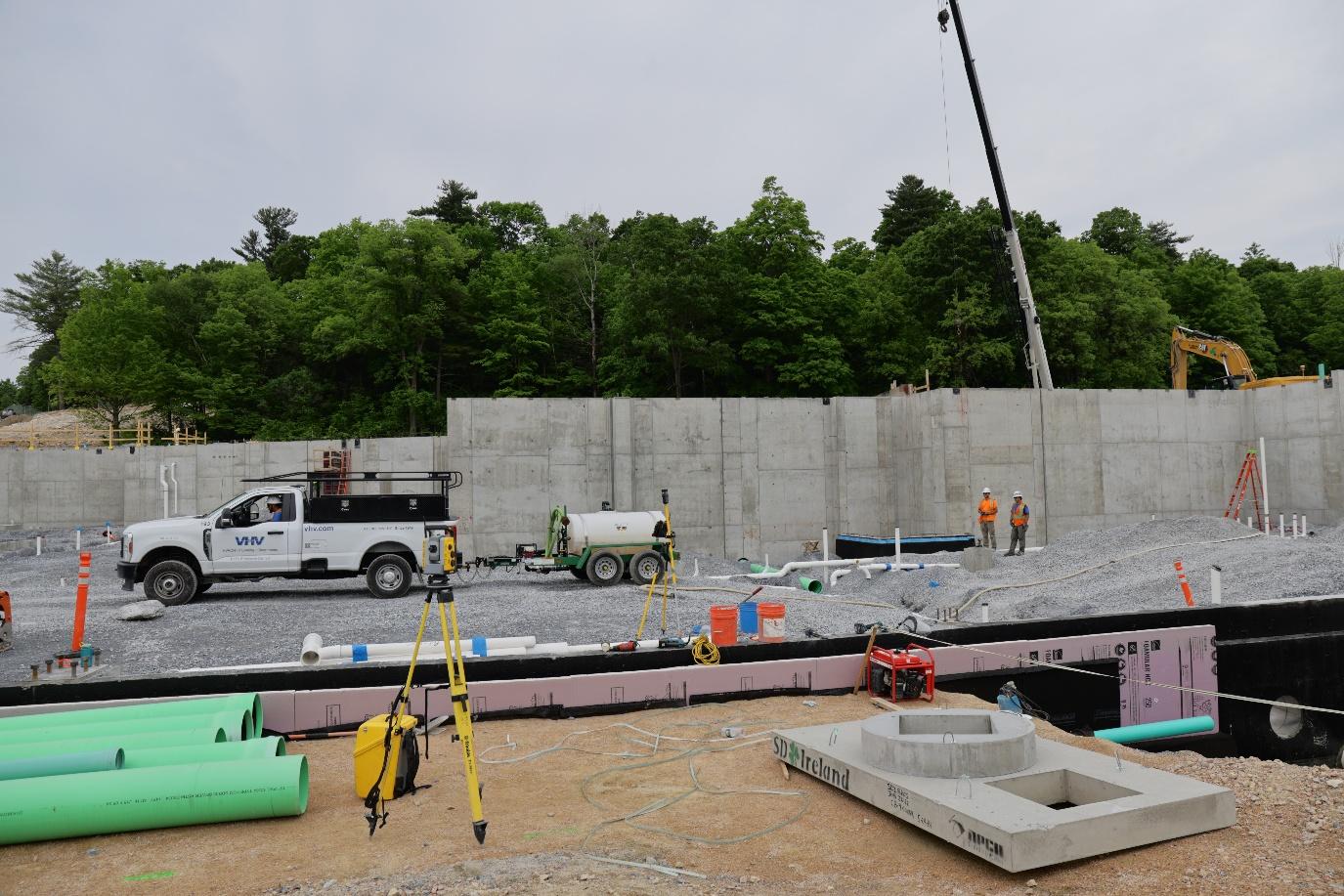 Survey layout equipment and VHV truck at the foundation