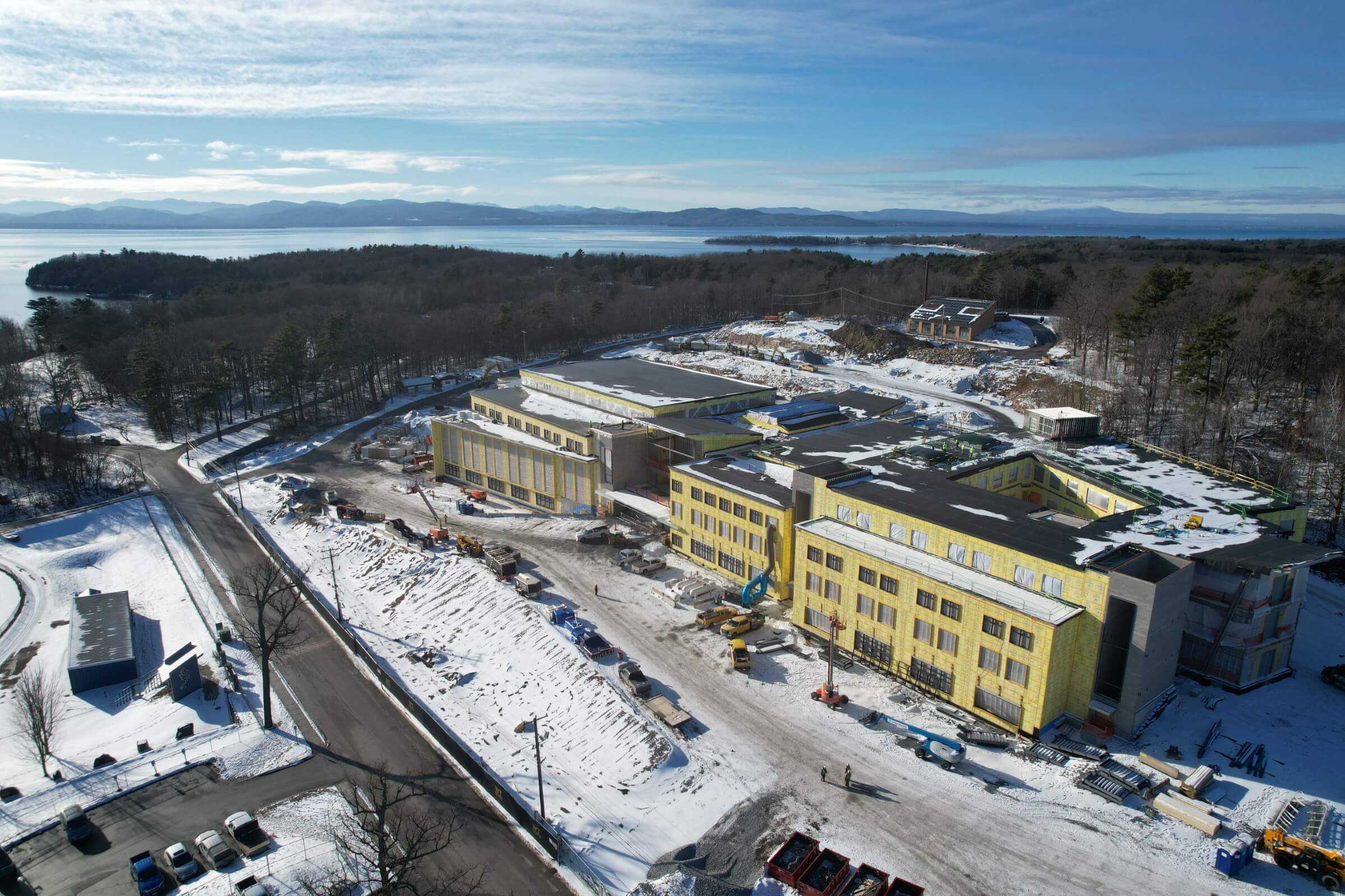 Aerial view of Burlington High School under construction in winter